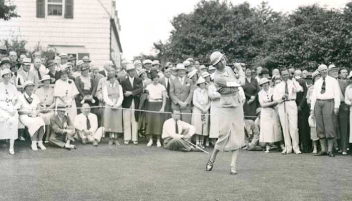 Joyce Wethered, who made a tour of North America in 1935, draws a crowd during an exhibition match on Long Island.